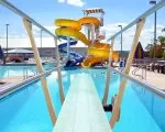 Thumnbail of commercial pool with slides