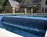 Thumnbail of swimming pool in garden with features