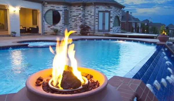 How to Add Finishing Touches to Your Pool With Water Features