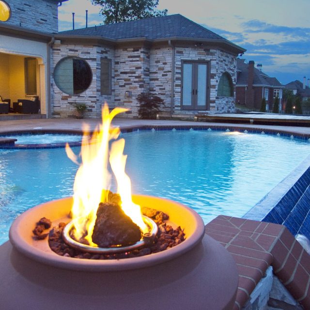 geometric pool with fire feature