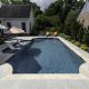 luxury swimming pool with pool furniture