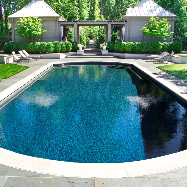 luxury backyard with outhouse and pool