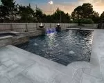 Thumnbail of luxury pool at twilight